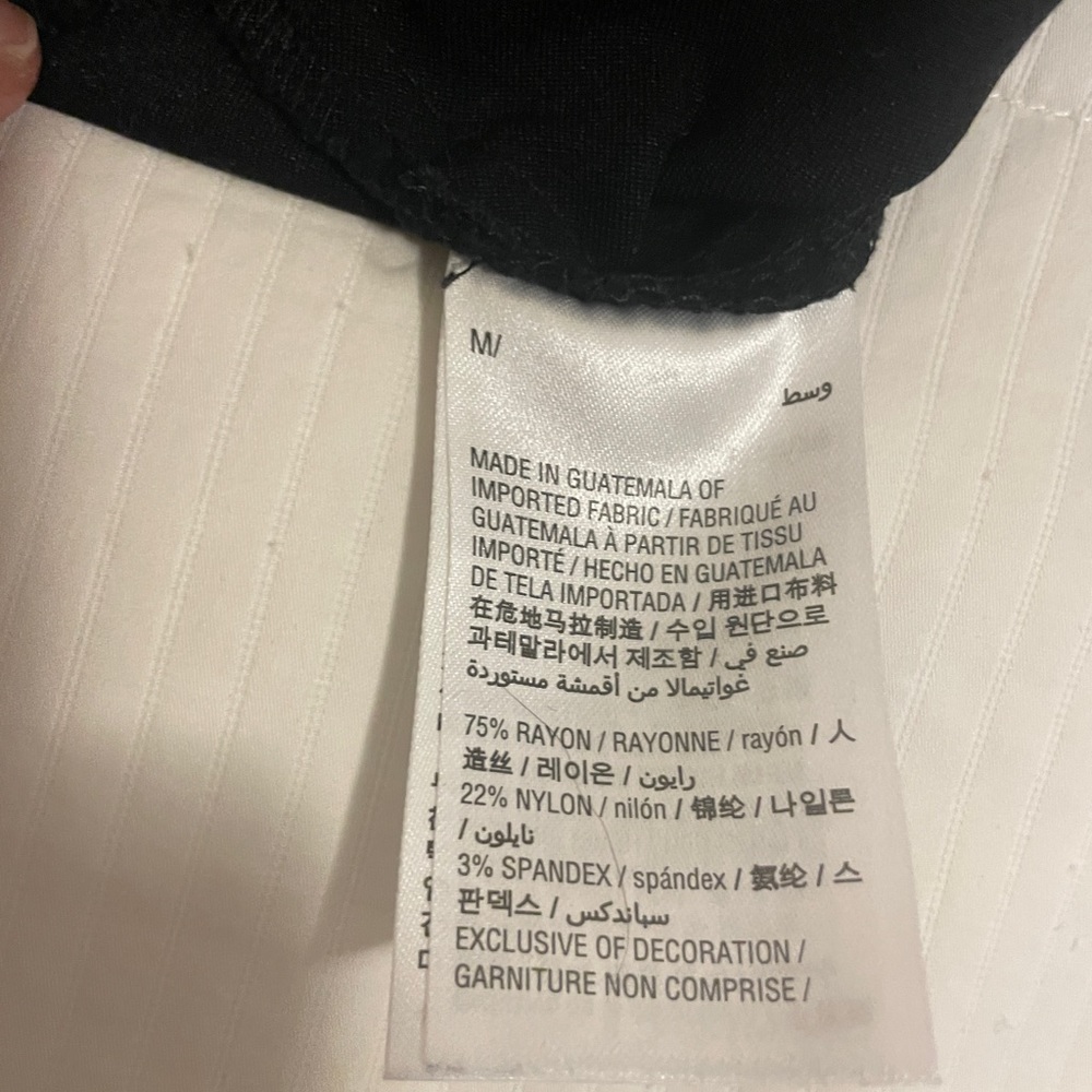 Bar III black ankle length pants. Fringe bottom pant leg w/decorative buttons. - Picture 6 of 6